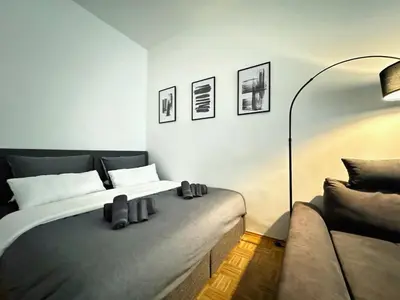 Ein Bett oder Betten in einem Zimmer der Unterkunft HolidayHome Apartments I Top Design Apartment in Heart of Berlin-Friedrichshain