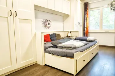 Ein Bett oder Betten in einem Zimmer der Unterkunft Berlin Bound Retreat 3 bedrooms