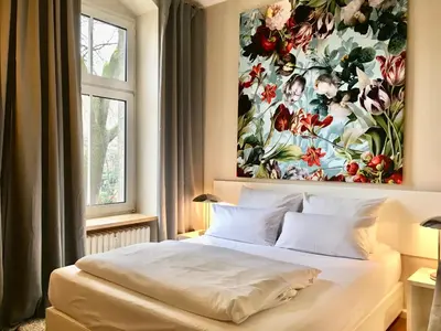 Ein Bett oder Betten in einem Zimmer der Unterkunft Berlin Style Apartments