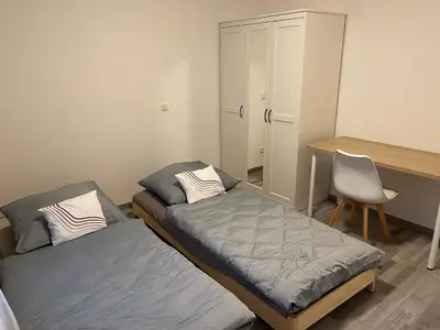 Ein Bett oder Betten in einem Zimmer der Unterkunft SybilleGaniaBerlin-Steglitz