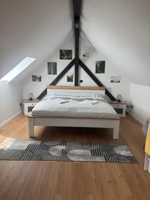 Ein Bett oder Betten in einem Zimmer der Unterkunft FeWo Landleben in Ferch