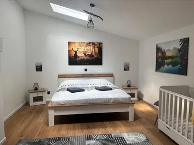 Ein Bett oder Betten in einem Zimmer der Unterkunft FeWo Landleben in Ferch