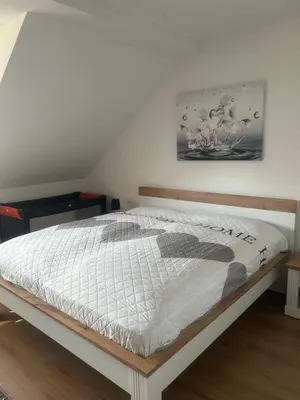 Ein Bett oder Betten in einem Zimmer der Unterkunft FeWo Landleben in Ferch