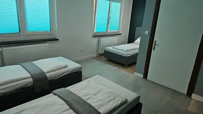 Ein Bett oder Betten in einem Zimmer der Unterkunft Hotel Delisa