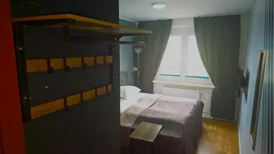 Ein Bett oder Betten in einem Zimmer der Unterkunft Hotel Delisa