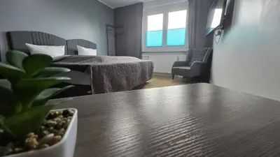 Ein Bett oder Betten in einem Zimmer der Unterkunft Hotel Delisa