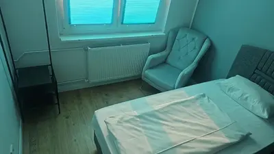 Ein Bett oder Betten in einem Zimmer der Unterkunft Hotel Delisa