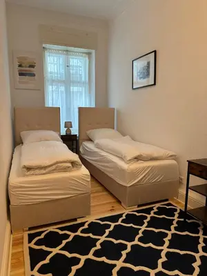 Ein Bett oder Betten in einem Zimmer der Unterkunft ROD 1 cozy city apartment