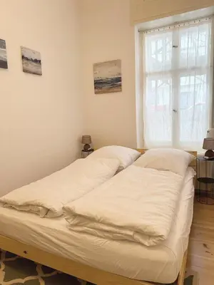 Ein Bett oder Betten in einem Zimmer der Unterkunft ROD 1 cozy city apartment