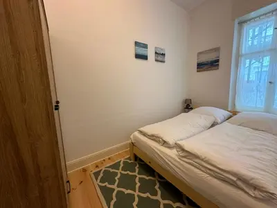 Ein Bett oder Betten in einem Zimmer der Unterkunft ROD 1 cozy city apartment
