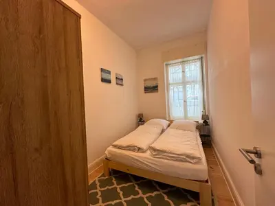 Ein Bett oder Betten in einem Zimmer der Unterkunft ROD 1 cozy city apartment