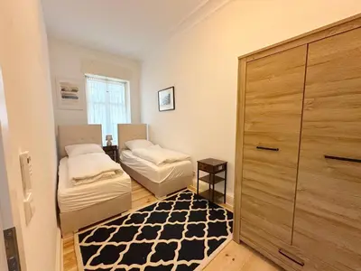 Ein Bett oder Betten in einem Zimmer der Unterkunft ROD 1 cozy city apartment