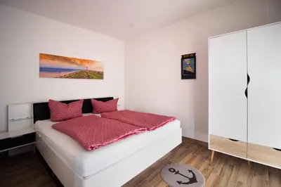 Ein Bett oder Betten in einem Zimmer der Unterkunft Marina Quenzsee