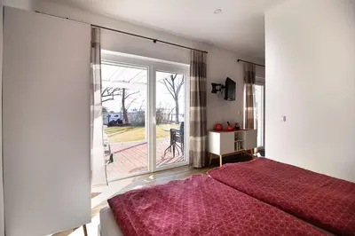 Ein Bett oder Betten in einem Zimmer der Unterkunft Marina Quenzsee
