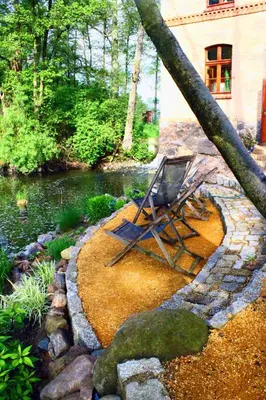Ein Garten an der Unterkunft Mühle Tornow am Wentowsee
