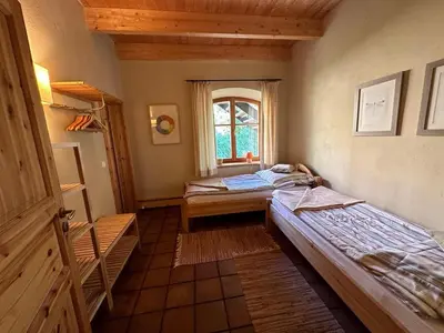 Ein Bett oder Betten in einem Zimmer der Unterkunft Stilvolle Gästezimmer auf romantischem Pferdehof