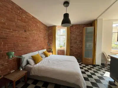 Ein Bett oder Betten in einem Zimmer der Unterkunft Villa Zeppelin