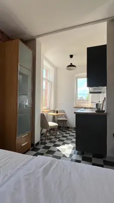 Ein Bett oder Betten in einem Zimmer der Unterkunft Villa Zeppelin