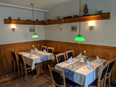 Ein Restaurant oder anderes Speiselokal in der Unterkunft Landgasthof Askanien