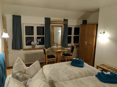 Ein Bett oder Betten in einem Zimmer der Unterkunft Landgasthof Askanien