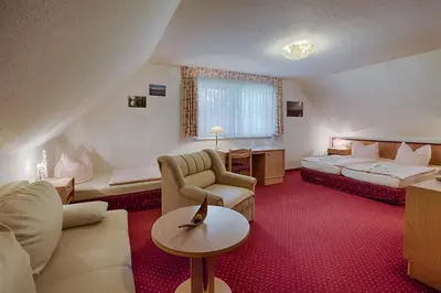 Ein Bett oder Betten in einem Zimmer der Unterkunft Seehotel Schorfheide