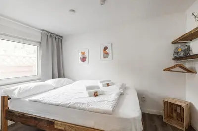 Ein Bett oder Betten in einem Zimmer der Unterkunft Cabin by the lake for 4 people with Fireplace and Sauna