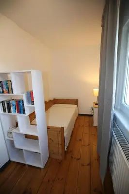 Ein Bett oder Betten in einem Zimmer der Unterkunft Goethe59