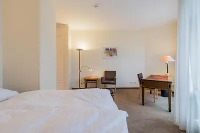 Ein Bett oder Betten in einem Zimmer der Unterkunft Apartmenthaus Berlin Mitte