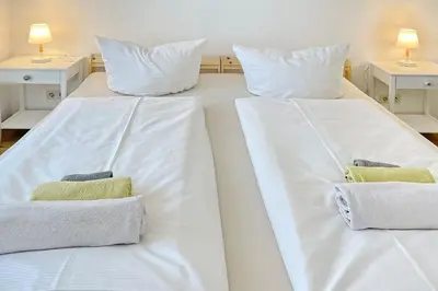 Ein Bett oder Betten in einem Zimmer der Unterkunft Libelle