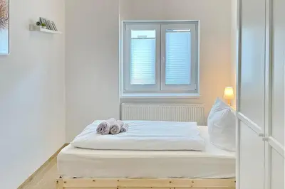 Ein Bett oder Betten in einem Zimmer der Unterkunft Libelle