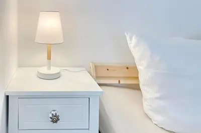 Ein Bett oder Betten in einem Zimmer der Unterkunft Libelle