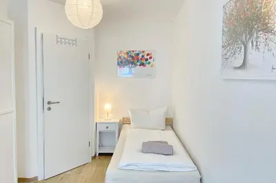 Ein Bett oder Betten in einem Zimmer der Unterkunft Libelle