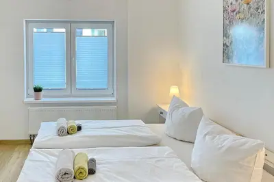 Ein Bett oder Betten in einem Zimmer der Unterkunft Libelle