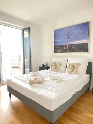 Ein Bett oder Betten in einem Zimmer der Unterkunft 5 Sterne Apartment, Nähe Flughafen Berlin, WLAN