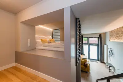 Ein Bett oder Betten in einem Zimmer der Unterkunft Exklusives Designer Loft nahe Hauptbahnhof