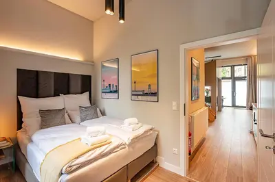 Ein Bett oder Betten in einem Zimmer der Unterkunft Exclusives Cube loft nahe Hauptbahnhof