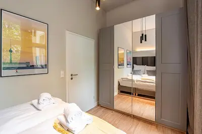 Ein Bett oder Betten in einem Zimmer der Unterkunft Exclusives Cube loft nahe Hauptbahnhof