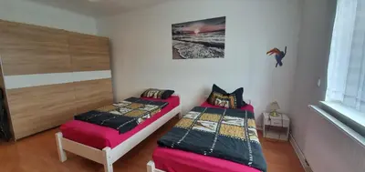 Ein Bett oder Betten in einem Zimmer der Unterkunft Ferienwohnung Sabine