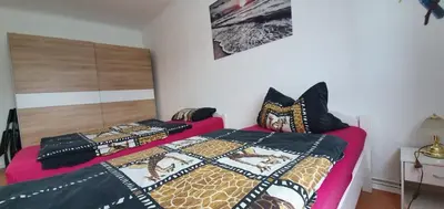 Ein Bett oder Betten in einem Zimmer der Unterkunft Ferienwohnung Sabine