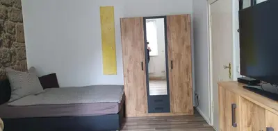 Ein Bett oder Betten in einem Zimmer der Unterkunft Ferienwohnung Sabine