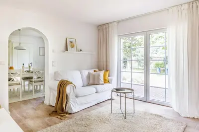 Ein Bett oder Betten in einem Zimmer der Unterkunft Ferienhaus Goldene Zeit I Terasse I Parkplatz I 3 SZ I 2 Bäder I 2 min zum See