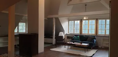 Ein Sitzbereich in der Unterkunft Ferienwohnung DG am Waldfriedhof