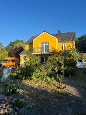 Ein Garten an der Unterkunft Am Stadtrand im Grünen