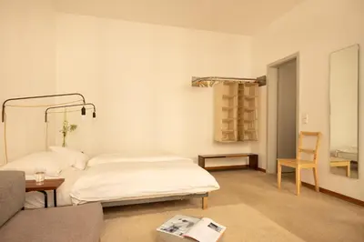 Ein Bett oder Betten in einem Zimmer der Unterkunft Miniloft Apartment Hotel