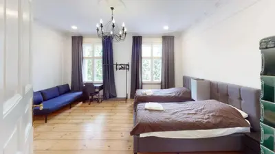 Ein Bett oder Betten in einem Zimmer der Unterkunft Villa Wittenau
