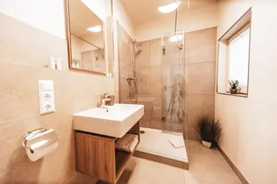 Ein Badezimmer in der Unterkunft Fontane Apartments