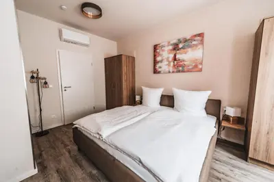 Ein Bett oder Betten in einem Zimmer der Unterkunft Fontane Apartments