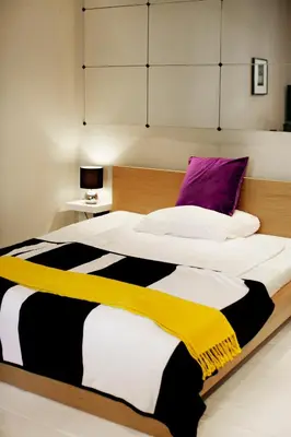 Ein Bett oder Betten in einem Zimmer der Unterkunft StyleApartments #2