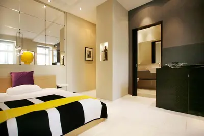 Ein Bett oder Betten in einem Zimmer der Unterkunft StyleApartments #2