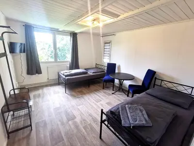 Ein Sitzbereich in der Unterkunft Monteur-Haus Agave Berlin Treptow, Neukölln, Altglienicke